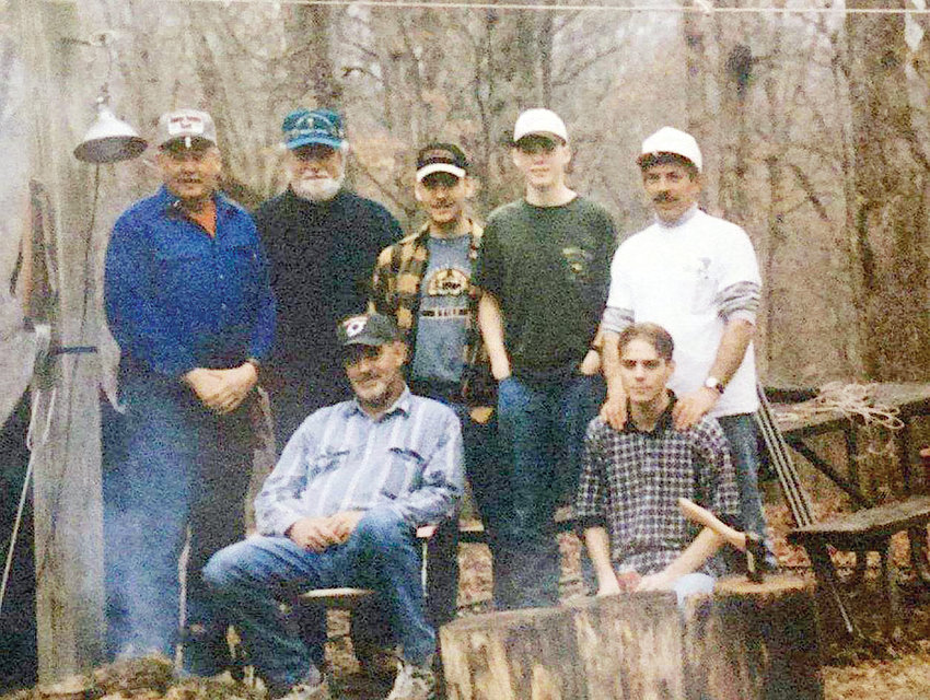 In 1973 some friends began a yearly tradition of camping and fishing in Bennett Spring State Park. Bob Manuel and Matt Manuel sit in front of Gerald Newman, Ron Rude, Jeremy Newman, Adam Miller and Tom Paul.