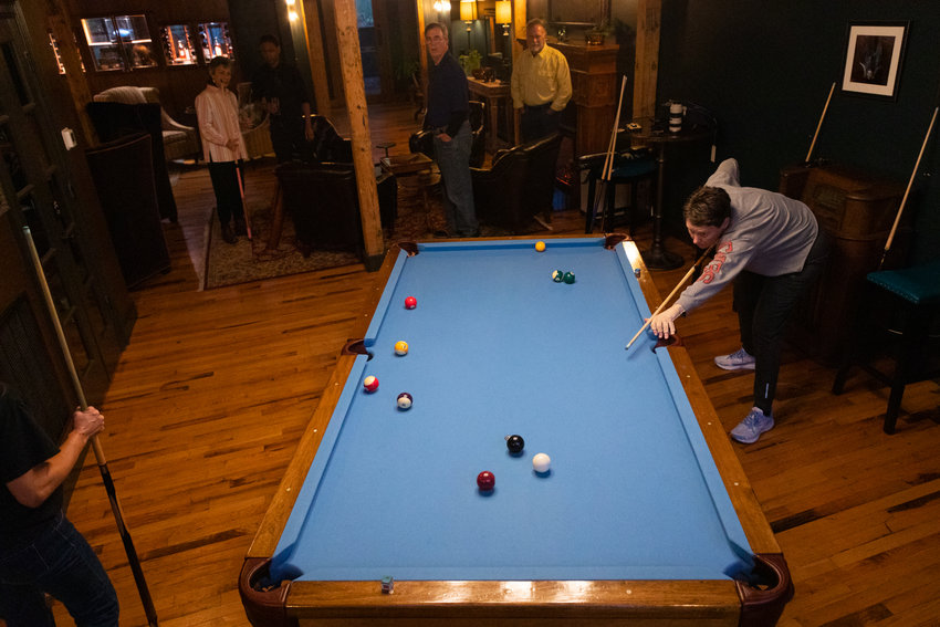 Debbie Shipley, member of the Pittsboro Pool League, lines up a shot during a match against Michelle Warrene at The Sycamore at Chatham Mills on Wednesday, Nov. 2, 2022. The League, started in 2019, has around 30 members and plays two 12-week seasons each year in addition to an annual Open Tournament.