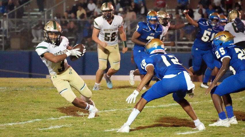 Northwood&rsquo;s Antoine Brewington makes a move while carrying the ball during the Chargers&rsquo; 49-0 win over Jordan-Matthews. Brewington had 10 carries for 129 yards and two touchdowns.