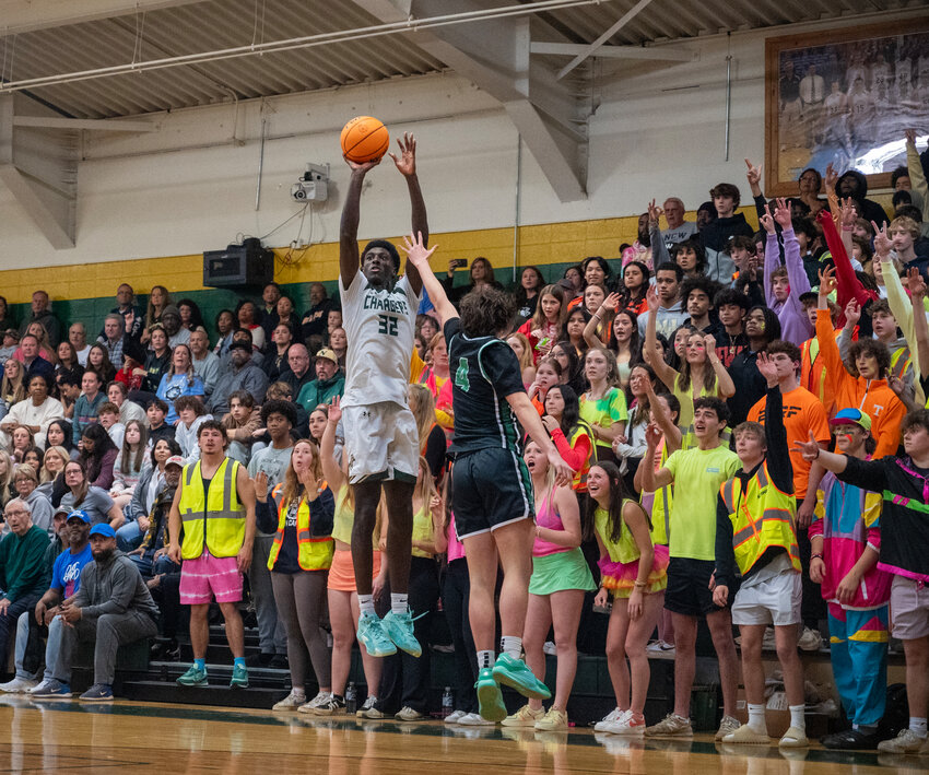 Northwood&rsquo;s Drake Powell hits a 3 pointer against Myers Park&rsquo;s Bram Early at Northwood high school in Pittsboro, NC on January 13, 2024. Myers Park defeated Northwood 63-47.