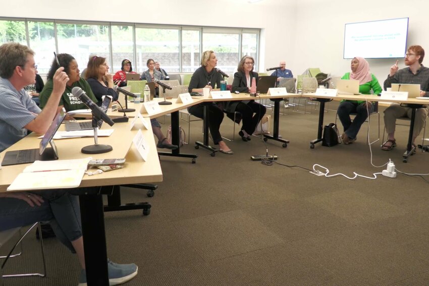 Members of the Chapel Hill Town Council deliberate at its April 26, 2024 meeting.