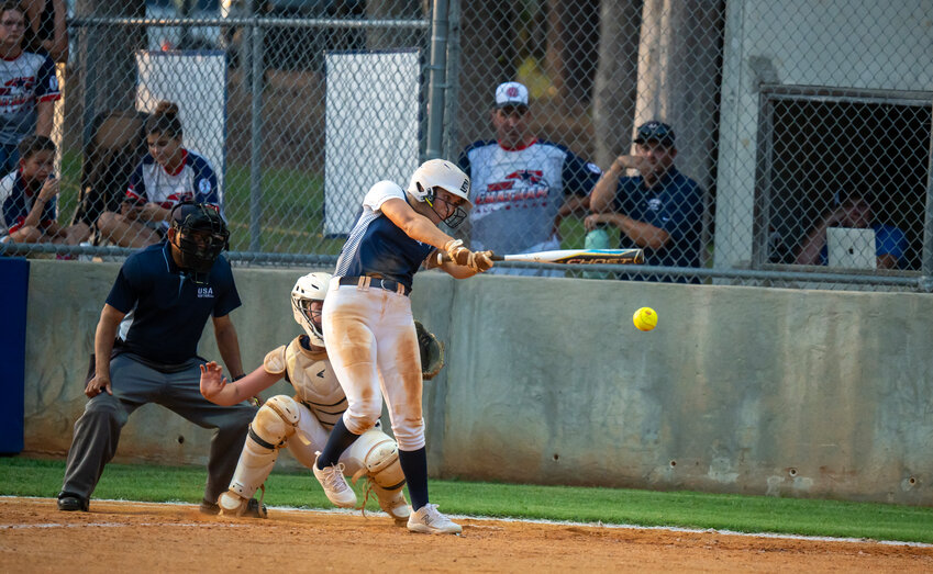 Chatham County&rsquo;s Logan Gunter hits a single against Randolph County during a Hero&rsquo;s league game at Jordan-Matthews high school in Siler City, NC on July 17, 2024.