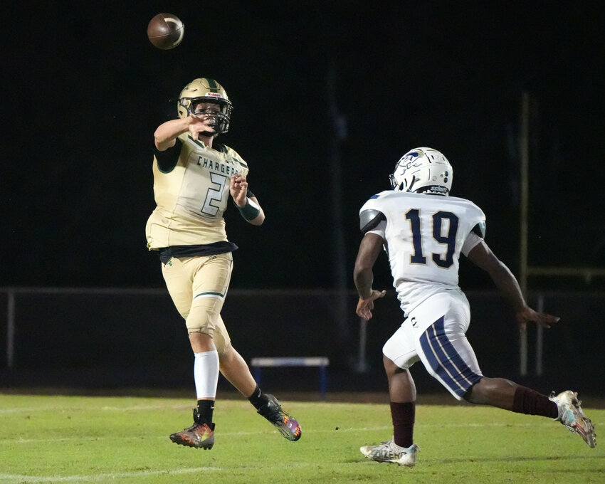 Grayson Cox (2), last year&rsquo;s backup quarterback, is in a preseason battle with transfer Raje Torres to start for the Chargers this season. (Gene Galin for Chatham News and Record)
