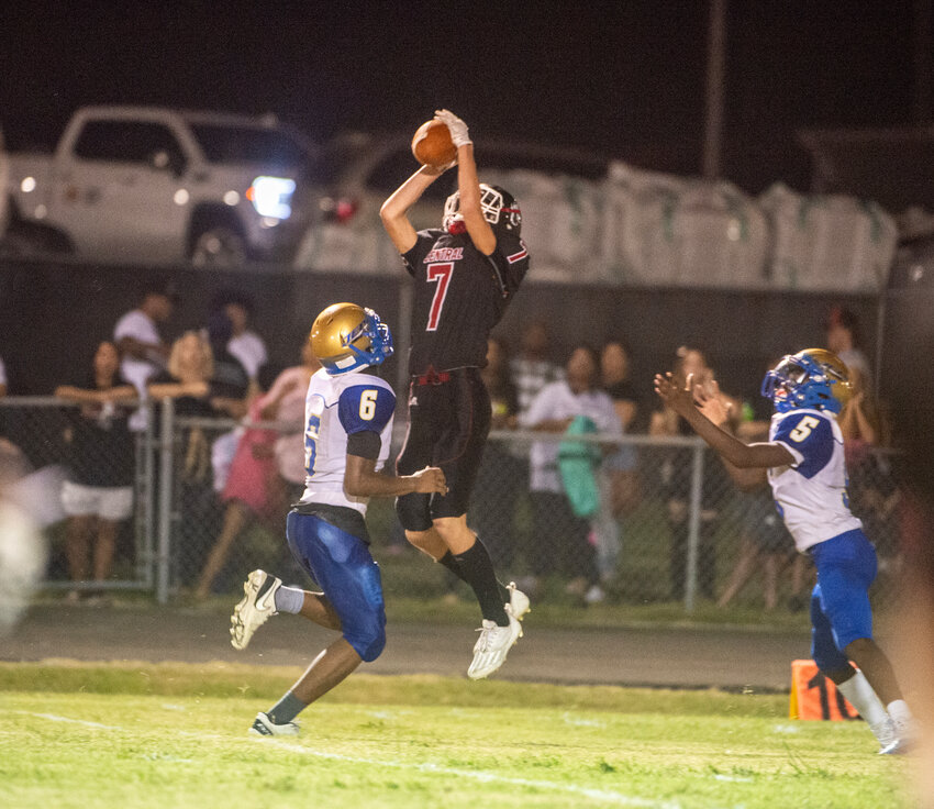 Chatham Centrals Luke Gaines jumps for the catch in front of Jordan-Matthews defenders last season. Gaines will be a key piece for the Bears' offense this year.