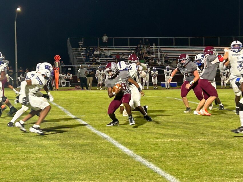 Seaforth running back Evan Minor (20) runs for a short gain against Westover on Aug. 23, 2024.