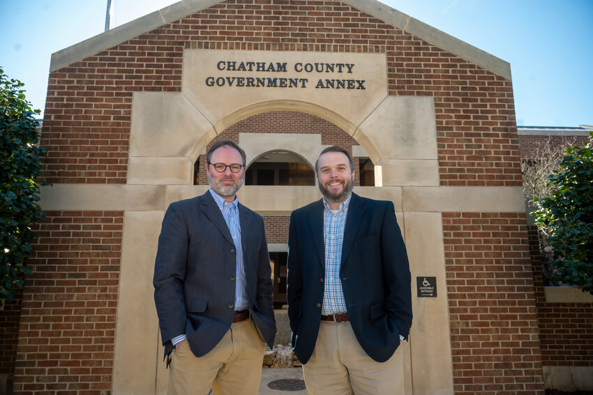 Newly appointed Chatham County Manager Bryan Thompson, left and assistant county manager Darrell Butts stand outside the Chatham County Government Annex in January in downtown Pittsboro.