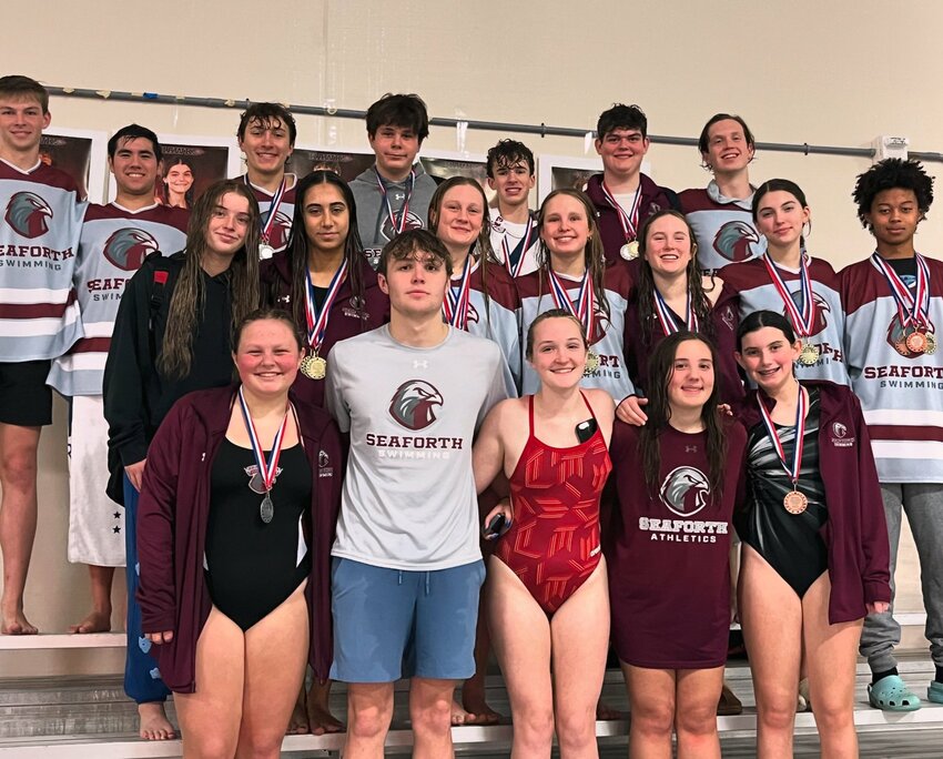 Seaforth&rsquo;s boys&rsquo; and girls&rsquo; swim teams pose with their medals after winning the conference championship.