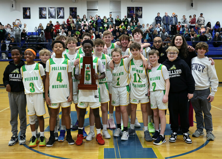 The Pollard boys celebrate their Chatham County Middle School basketball title