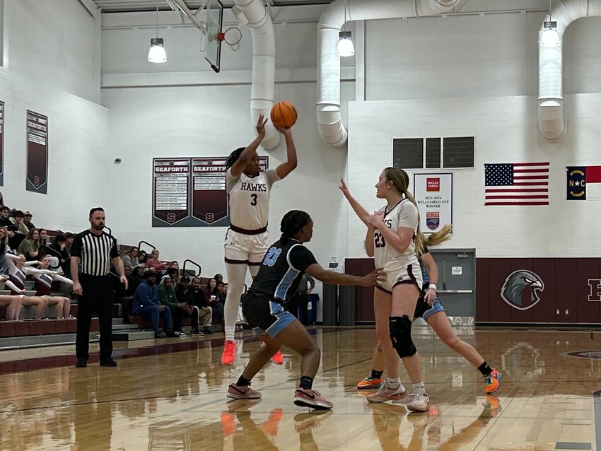 Seaforth&rsquo;s Gabby White takes a three-pointer during a fourth-round game against East Duplin. The Hawks advanced to the regional championships with a win