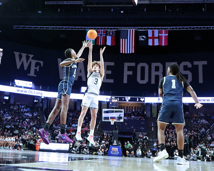 Northwood&rsquo;s Cam Fowler (3) puts up a shot in the NCHSAA championship game against Reidsville. Fowler&rsquo;s 27 points weren&rsquo;t enough as the Chargers finished as state runners up