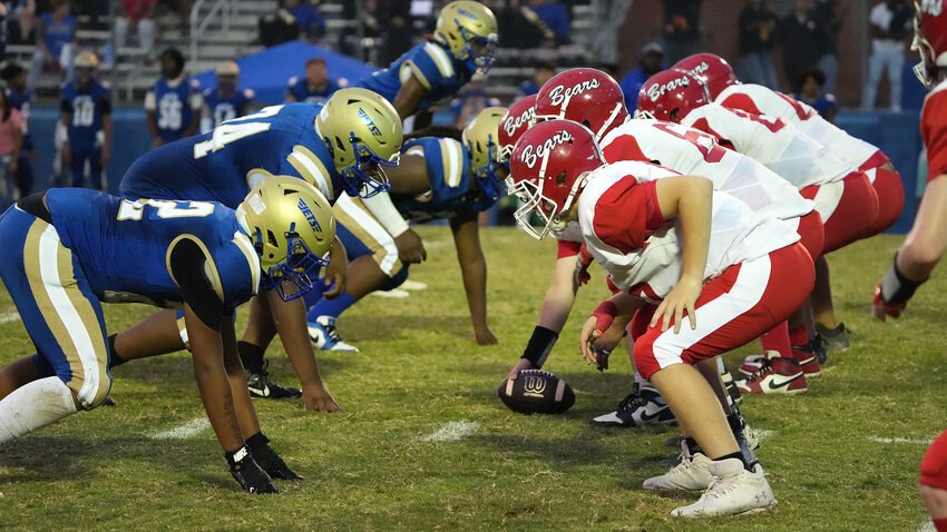 Jordan-Matthews (left) and Chatham Central line up in the trenches during last fall&rsquo;s showdown. The rivalry will continue in a week two game this season