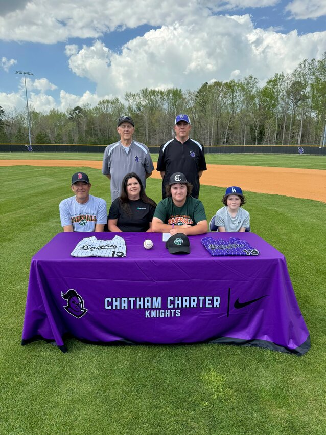 Luke Johnson is all smiles after signing to play at Mid-Atlantic Christian University