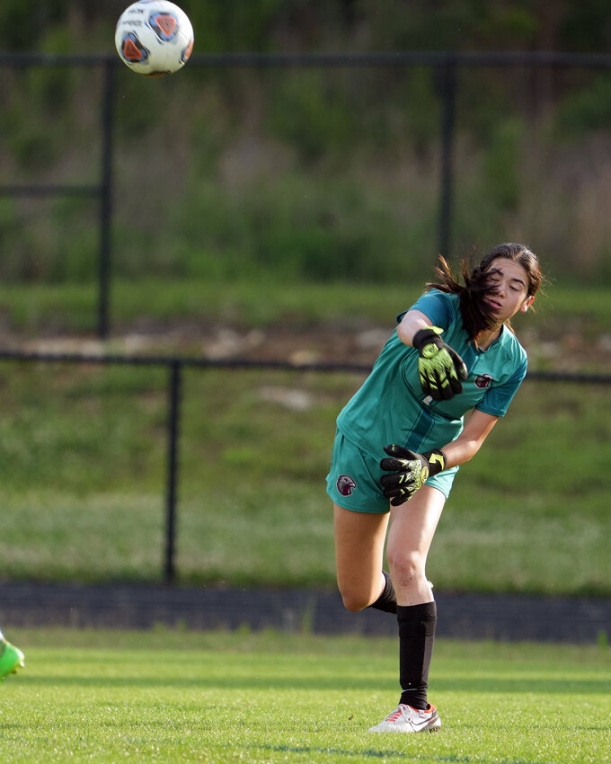 Seaforth goalkeeper Katie Leonard launches the ball after a save against NCSSM-Durham. Leonard came up big in both of the Hawks&rsquo; playoff wins last week.