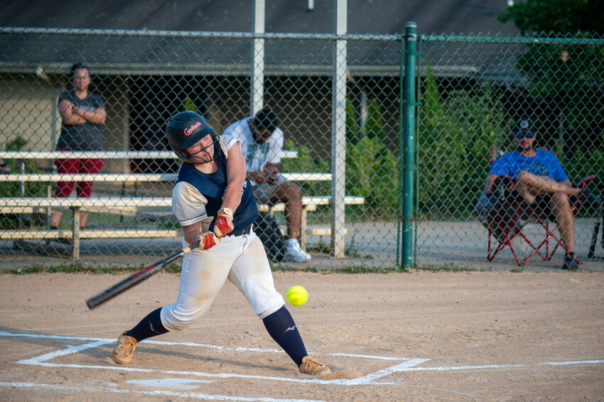 Chatham Heroes 292's Emma Burke hits a double in the top of the first inning against North Wake during a division game at The Factory in Wake Forest, NC on June 26, 2024.