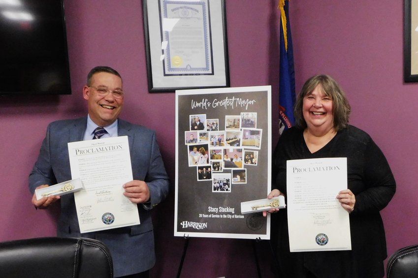 Mayor Stacy Stocking and Connie Cauchi display their proclamations and keys to the city.