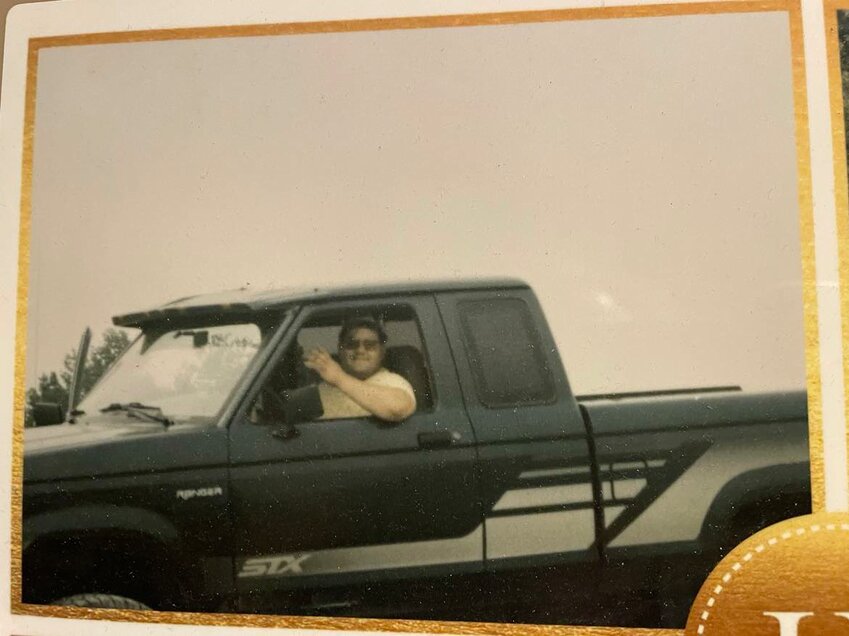 Barryin his twenties driving the Ranger sometime in the 1990s. The photo is in a collage of photos given to Barry for his 50th birthday by longtime friends John and Lacie Curns.