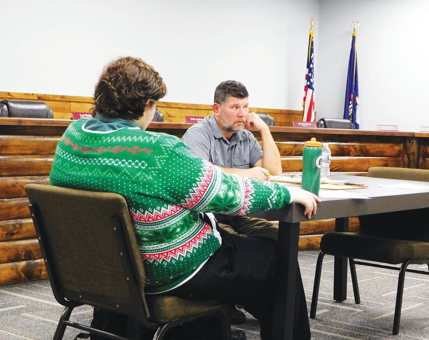 Commissioners David Hoefling, left, and Gabe Ambrozaitis field a question during the December meeting of the Clare County Airport Committee.