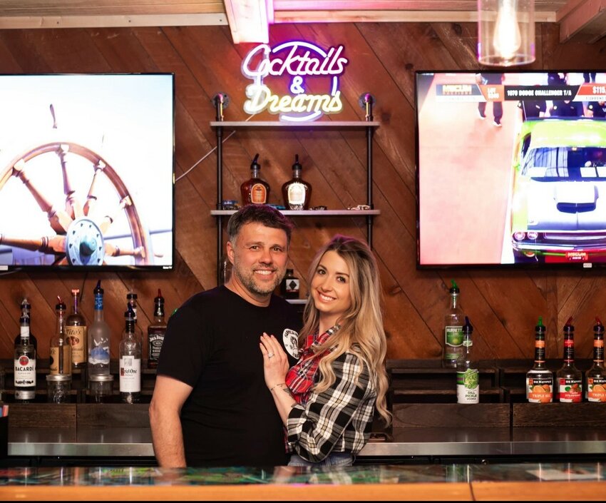 Meagan and Derek McComber, owners of the newly renovated garage themed bar in Farwell, Hammerin’ Hank’s.