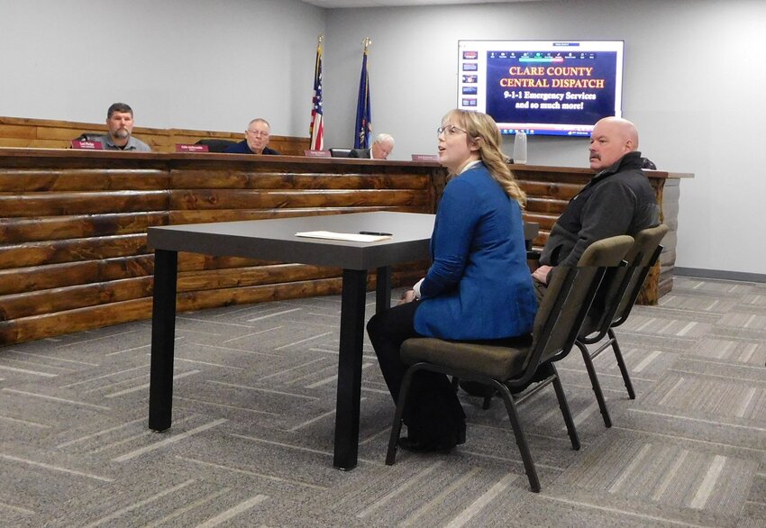 Marlana Terrian, Central Dispatch director, left, provides the Clare County Board of Commissioners with an in-depth overview of what her department provides for the people it serves. Sheriff John Wilson accompanied Terrian at the March 20 meeting.