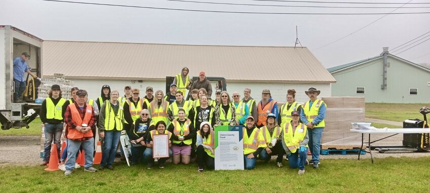 Clare County Food Group volunteers are shown with the Hunger Action Partner Award at the May 4 mobile distribution event held at the Clare County Fairgrounds.