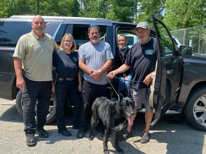 The Gilberts and their dog drop by to visit the Animal Shelter crew who helped to rescue their wayward dog. Pictured, from left, are Animal Control Director Bob Dodson, ACOs Tara Westphal and Paul Bradley, and Estela and Dave Gilbert.