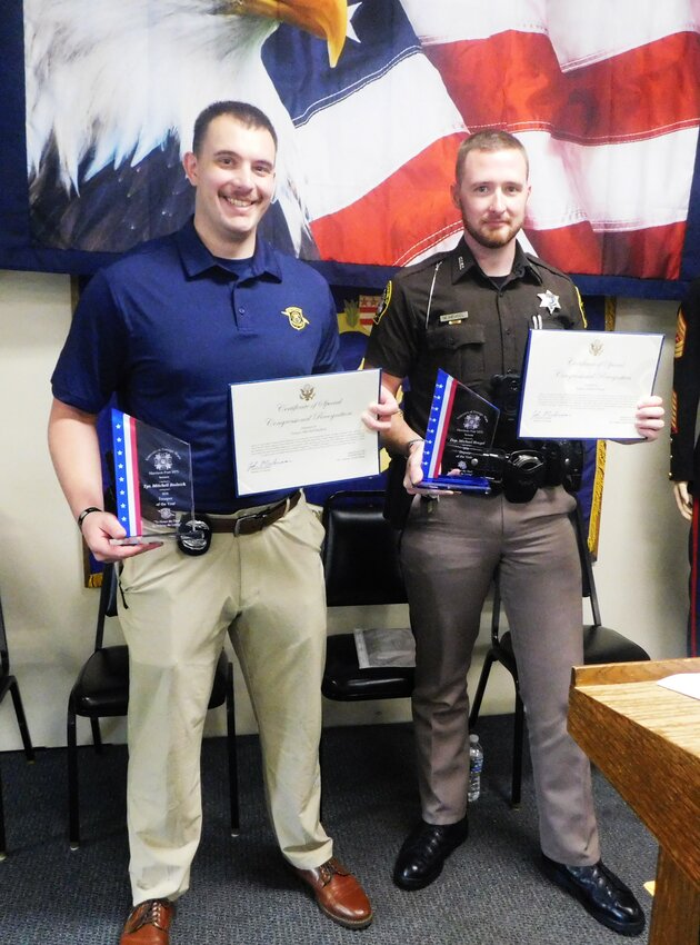 MSP Trooper Mitchell Budnick, left, and Clare County Deputy Michael Heugel proudly display their Congressional Recognition Awards received at the Sept. 20 POW-MIA Recognition Day observance at VFW Post 1075 in Harrison.