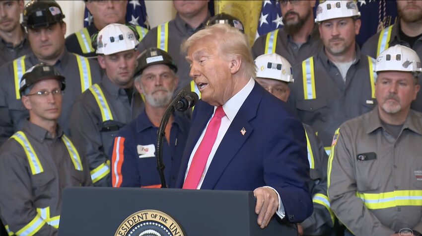 A group of coal miners watch as President Donald Trump speaks at the White House shortly before signing executive orders on the coal industry on April 8, 2025. (White House livestream)