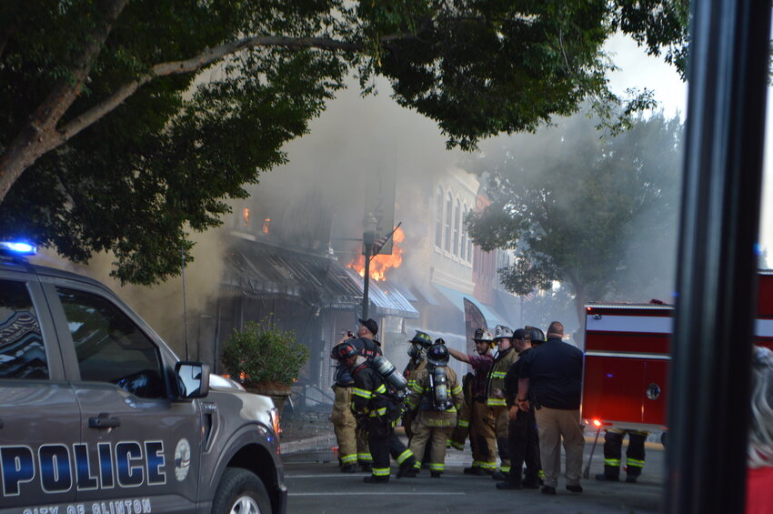 Fighting the Aug. 27 fire in Uptown Clinton