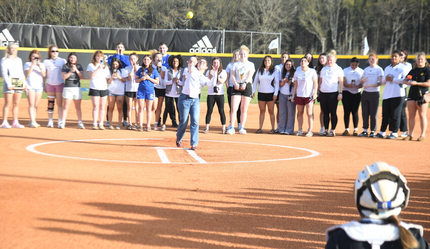 Carina Giangeruso, freshman from Hamilton, NJ, an All-American and 4th place national finisher for the PC women's wrestling team, throws the first pitch at Wednesday's Blue Hose vs Terriers softball match.