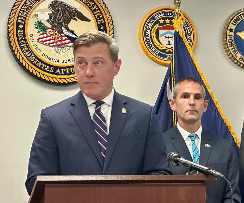 Acting U.S. Attorney for the District of South Carolina Brook Andrews, left, along with Mike Tooley, an assistant special agent with the U.S. Drug Enforcement Agency, right, announced the indictment of three men on Thursday, April 24, 2025, in Columbia, related to a $30 million money laundering operation with ties to Mexican drug cartels. (Photo by Jessica Holdman/SC Daily Gazette)