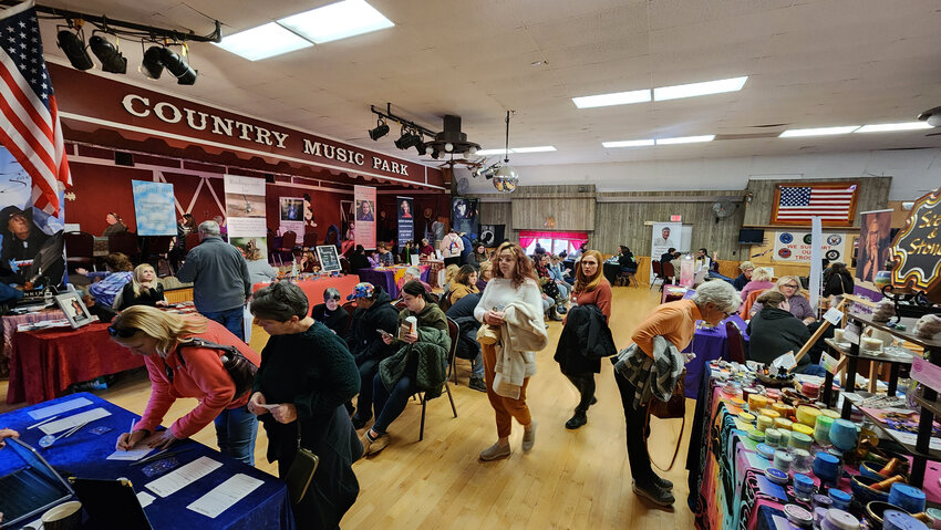 People mingle at the 2023 Experience Psychic Fair at the Cortland Country Music Park. The event returns Feb. 24 and 25.