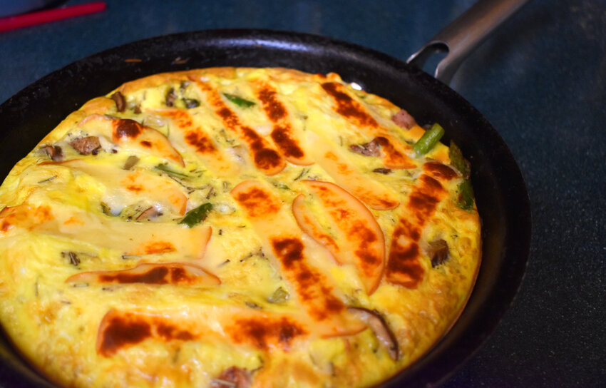A frittata is a wonderful way to clean the refrigerator of leftovers, and a lot easier to make than an omelette.