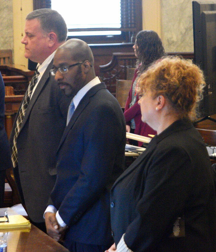 The trial for accused attempted killer Tyshawn Pittman continued Monday, with jurors requesting to review the 911 call reporting the December 2022 shooting, and the testimony of the victim. Pittman stands with his attorneys, Janice Stafford and Jarrod Smith.