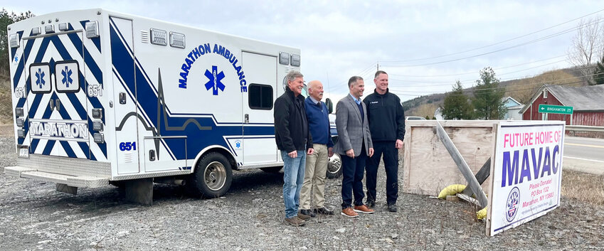 Marathon Area Volunteer Ambulance Corps President Don Bliss, Mayor Scott Chamberlin, Rep. Marc Molinaro and MAVAC ambulance chief John Tillotson stand at the site of what will become the ambulance service's new headquarters, funded largely from federal grants.