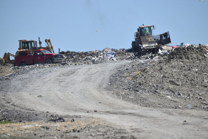 Cortland County Landfill crews work Tuesday afternoon at the site in Solon. The county Legislature's Highway Committee met earlier in the day to discuss options for how to handle solid waste after the facility is full in 12 years. No decisions were made.