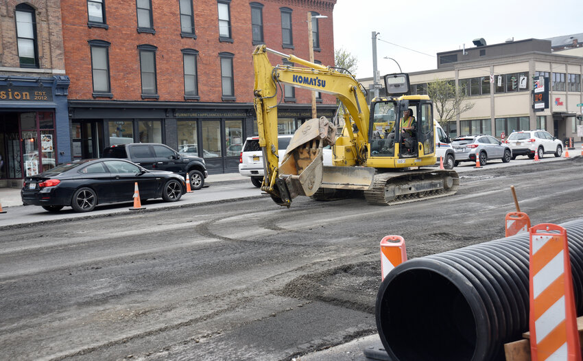 Reconstruction of Main Street in Cortland resumed Monday after a winter hiatus with removal of the temporary asphalt on the west side between Groton Avenue and West Court Street.