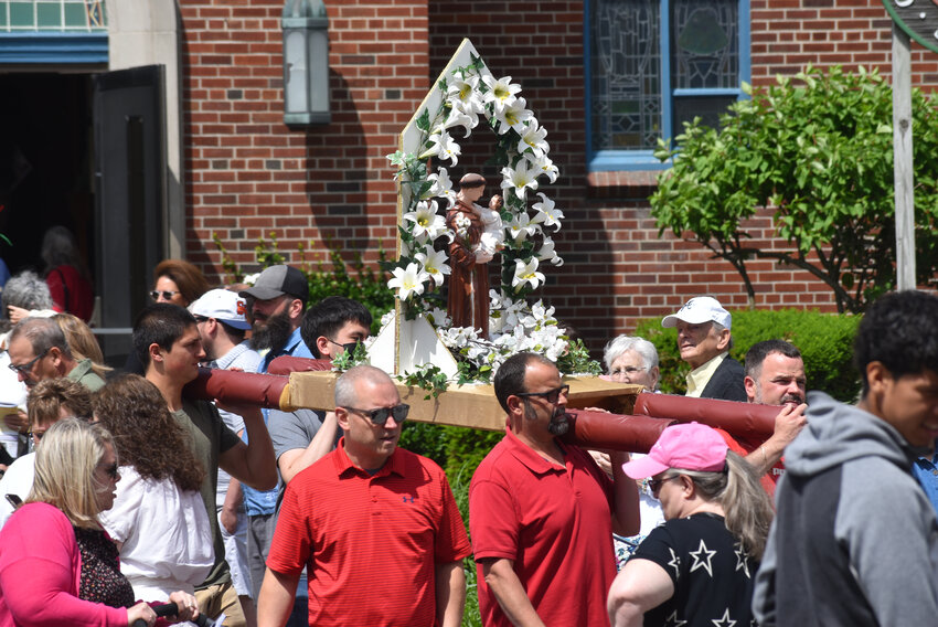 Parishioners of St. Anthony of Padua Church in Cortland assemble a procession in 2022 around the East Side of Cortland as part of the second day of the St. Anthony's Festival. The event returns in June.