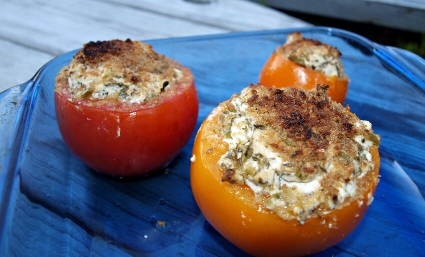 Stuffed tomatoes are easy, flexible and an impressive side dish. Get 'em while they're ripe from the back yard.