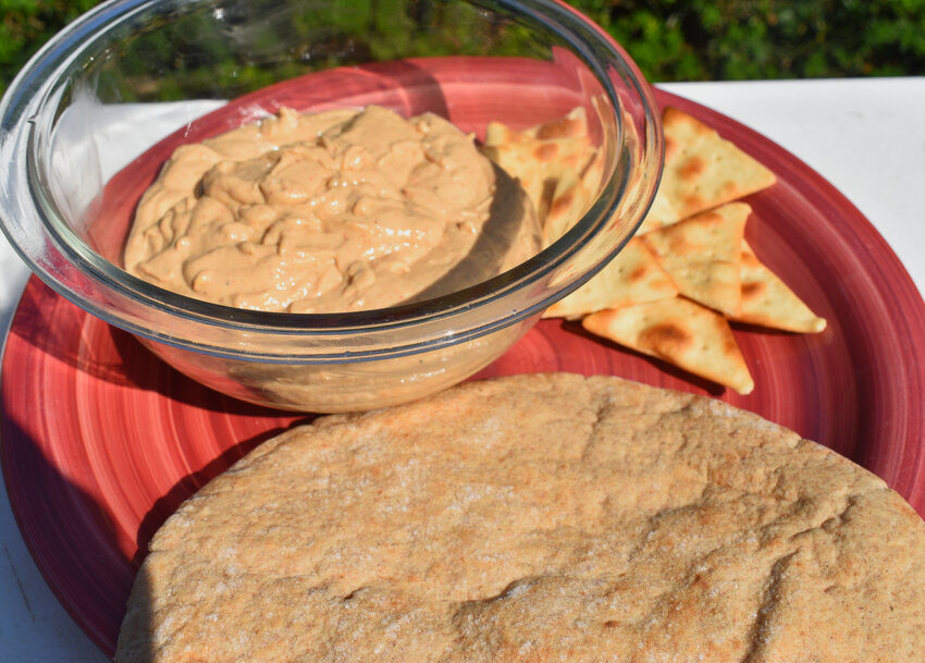 The secret to baba ganoush is to grill the eggplant, which gives it a nice smoky flavor. But you can broil it, or grill it over a gas stove, too.