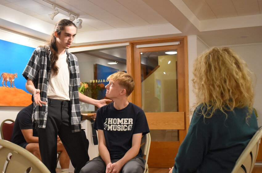 Jorin Santora, left, Toby Carr and Rebekah Toner rehearse a scene from "The Giver," which ran in November at the Center for the Arts of Homer. Rehearsals start soon for the first of eight theatrical productions planned for 2025.