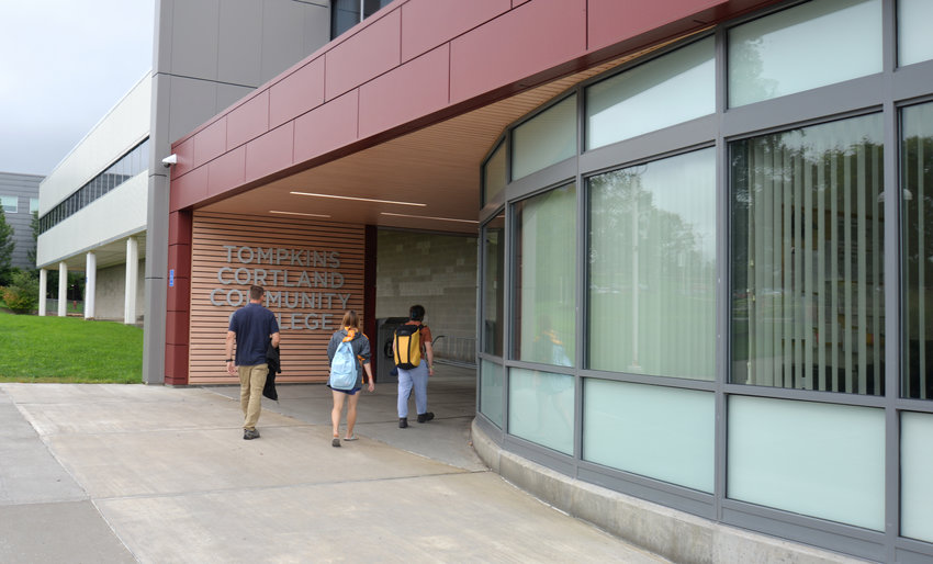 Students and an instructor at Tompkins Cortland Community College enter the college in 2022. TC3 co-enrollment program recently won certification as the college reports that students who enter college already having credits tend to stay in school, and pursue further education.
