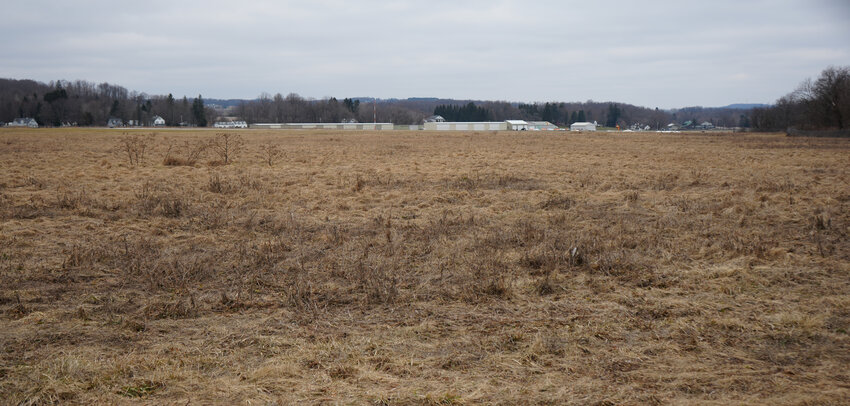 The land at the southwestern end of the Cortland County Airport, Chase Field, sits empty -- its use restricted by the Federal Aviation Administration. However, a proposed solar project by Abundant Solar Power Inc., based in Rochester, would  meet FAA size requirements. The county approved a lease for the project Thursday