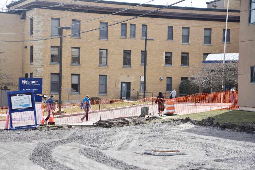 People walk in early April near the entrance to Guthrie Cortland Medical Center off Alvena Avenue in Cortland. The hospital's main entrance will be closed for four to six weeks starting Monday.