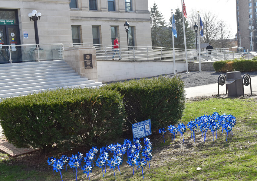Pinwheels, shown Tuesday afternoon, have been placed outside the entrance of the Cortland County Courthouse to mark Child Abuse Prevention Month, which is April.