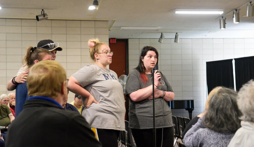 Ashley Benjamin, left, and Jenna Deiss, both of whom lack homes, speak Thursday at SUNY Cortland -- Deiss' former employer. Six homeless people addressed people at a forum about how a community can help people like them, including to stop assuming they have addictions and criminal backgrounds.