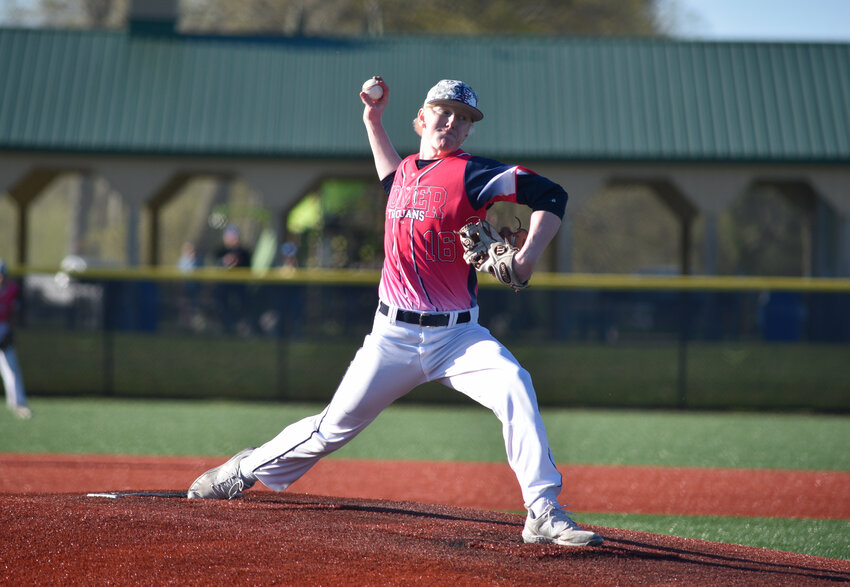 Homer’s Mitchell Earle delivers a pitch Thursday at Gutchess Lumber Sports Complex. Earle struck out 11 over seven innings in a 2-1 Homer win.