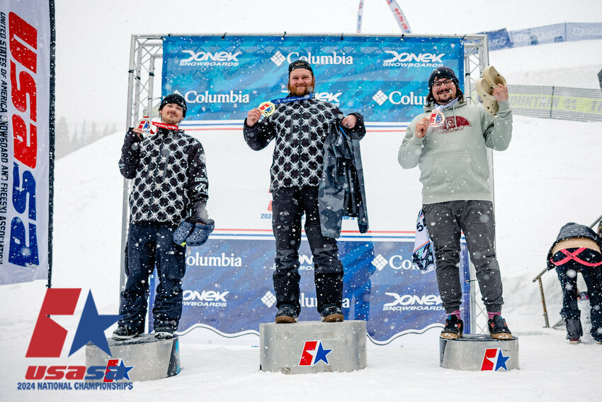 CNY FreeRide’s Jordan Smith, center, and Brody Reardon, left, pose with their gold and silver medals, respectively, at Copper Mountain in Frisco, Colorado.