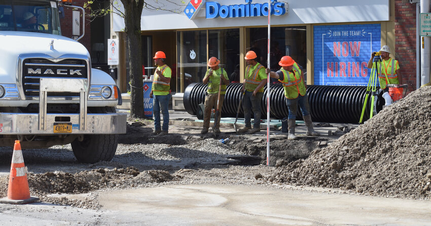 Contractors continue work Wednesday on Court Street Wednesday. The city recently ended the employment of a public works official, causing concern among public safety board members, although Mayor Scott Steve said it won't affect the season's construction.