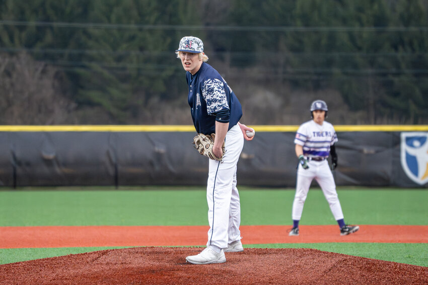 Homer’s Mitchell Earle prepares to deliver a pitch earlier this season. Earle finished his career at Homer with 286 strikeouts, a new school record.