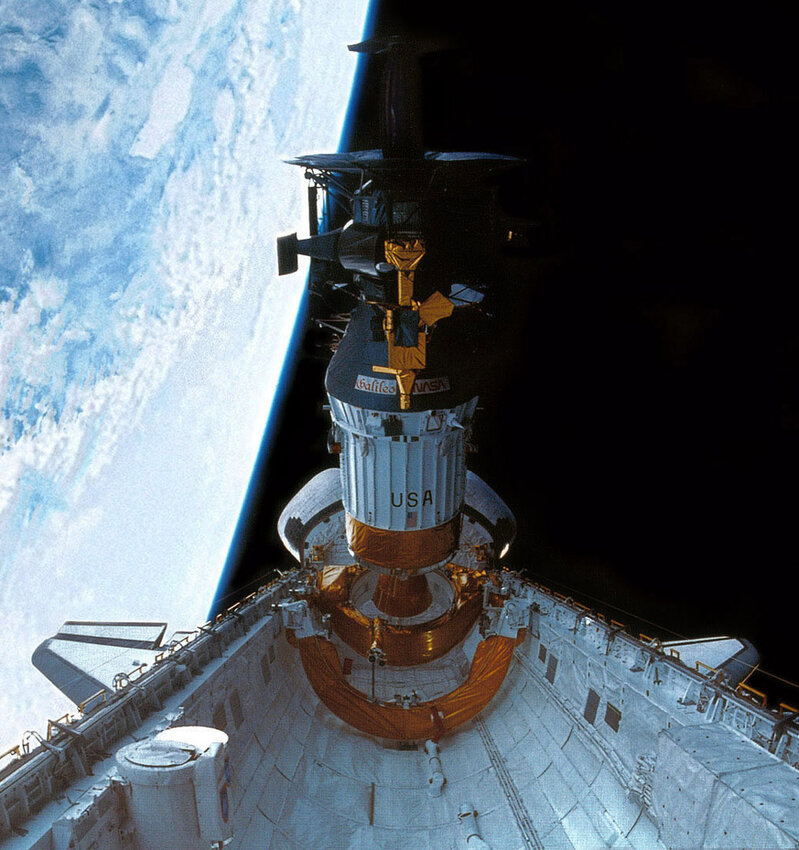 The Galileo space probe is readied for launch from orbit in the bay of the space shuttle Atlantis.